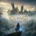 Promotional image for "Hogwarts Legacy," depicting a solitary figure looking towards the iconic Hogwarts castle amidst a misty, magical landscape with dragons soaring in the sky.
