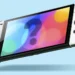 The image shows a Nintendo Switch gaming console against a plain light blue background. The screen of the Switch displays a colorful, abstract design with a large question mark in the center, suggesting a sense of mystery or an announcement about an upcoming game or feature. The Joy-Con controllers are attached to either side of the device, indicating it is in handheld mode.