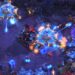 StarCraft 2 scene: Futuristic battle with vibrant lasers and mechs on alien terrain.
