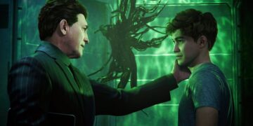 A scene from the Spider-Man 2 game shows a tense moment between Norman Osborn and Harry Osborn in a green-lit room, with mysterious tendrils in the background.