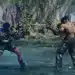 Una escena modificada de Tekken 8 que presenta a dos luchadores en una arena de bosque exuberante y detallada, destacando aspectos de personajes personalizados y modificaciones ambientales vibrantes.