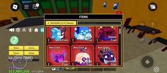Inventory screen from the Roblox game Blox Fruits showing various powerful fruits like Spirit, Venom, Shadow, and Blizzard, with the player's stats and in-game currency displayed on the left.