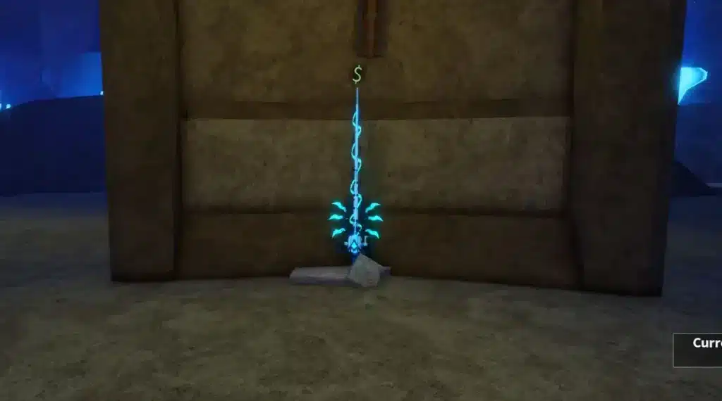 A glowing blue fishing rod is displayed upright on a pedestal inside a dimly lit stone chamber in Roblox. The rod emits a mystical aura, with a green dollar sign hovering above it, indicating its value or purchase option. The environment suggests a hidden or special location, possibly for acquiring rare fishing gear.