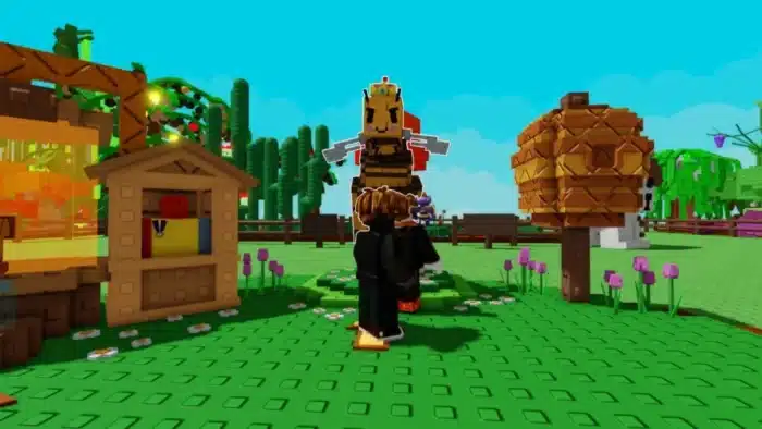 Two Roblox players stand near a giant bee NPC and a hive fruit tree in a colorful garden scene in "Grow a Garden." 
