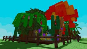 A vibrant garden in Roblox’s "Grow a Garden" features large colorful trees, flowers, and vines growing inside a fenced area.
