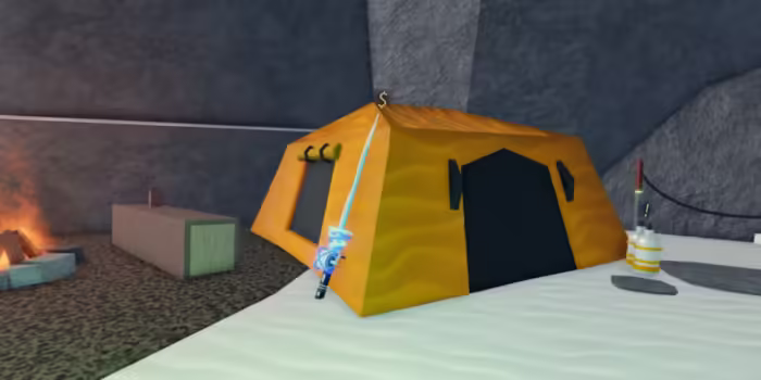 A bright orange tent set up inside a snowy cave in Roblox Fisch’s Northern Expedition, with a glowing blue sword leaning against it, a campfire burning nearby, and camping equipment scattered around.