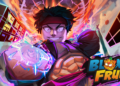 A powerful character charges energy with glowing fists and intense aura in Blox Fruits, with the game logo at the bottom right.