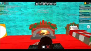 Roblox Work at a Pizza Place scene showing a cozy room with a brick fireplace, decorated for the holidays, next to a bed and blue walls. Player UI is visible.